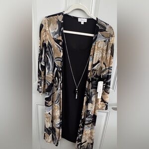 NWT. Long sleeved dress. Cardigan is attached. Necklace is attached. Size L.